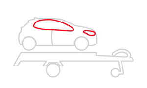 Une petite voiture placée sur une remorque à deux roues